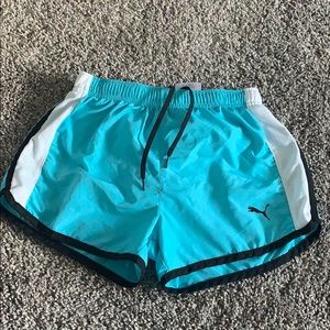 Blue black and white running shorts